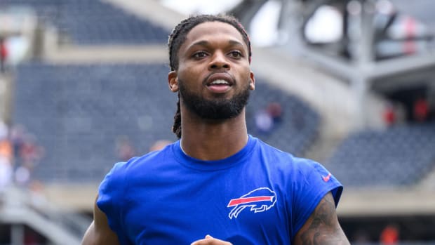 Bills safety Damar Hamlin runs off the field following a preseason game.